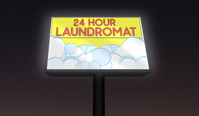 Backlit banner illuminated at night for outdoor business signage